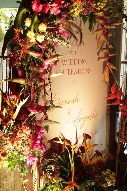 Signage and Floral detail — Arrival / Lobby decor — Taj Exotica
